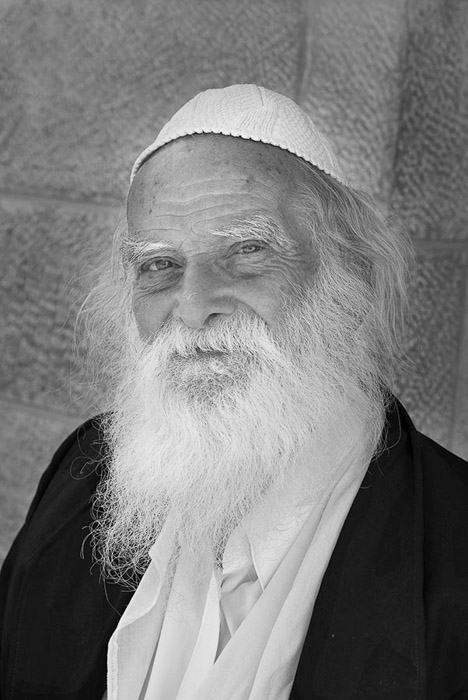 Man Sitting Near Kotel BW 1610