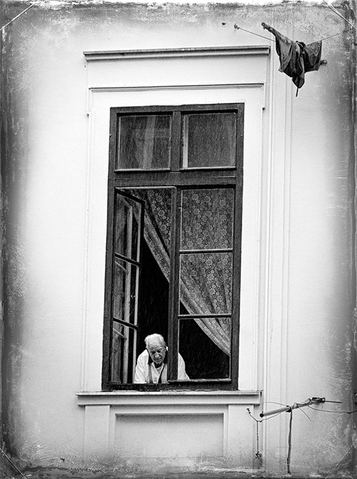 Budapest Man In Window BW 0140